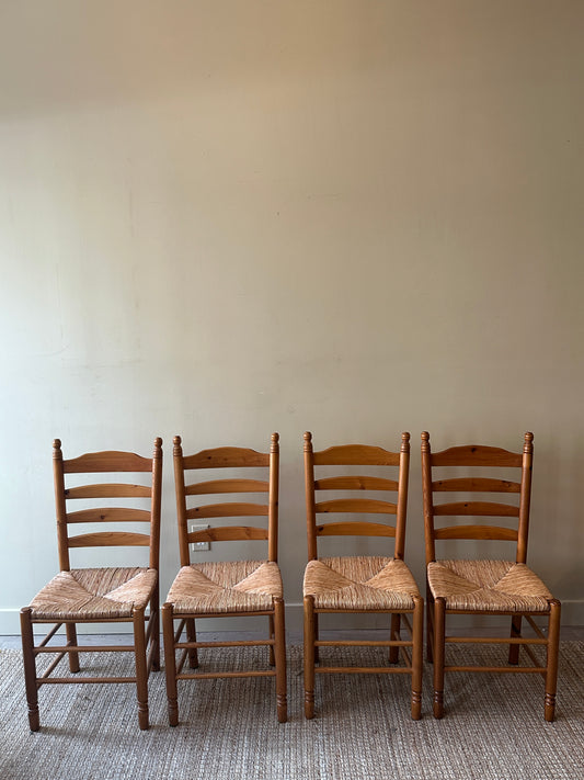 4 rush chairs. Sold as a set of four.