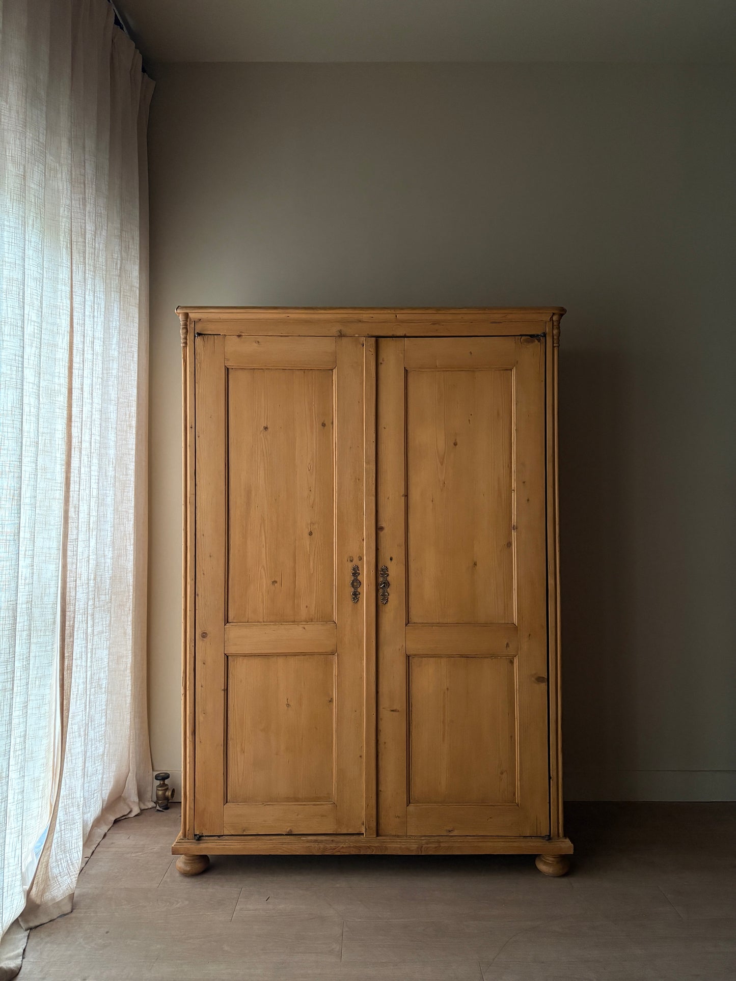 Gustavian waxed pine armoire