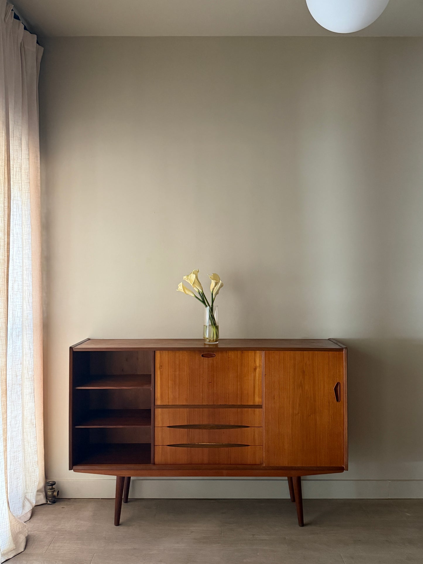 Danish teak sideboard with drop down bar
