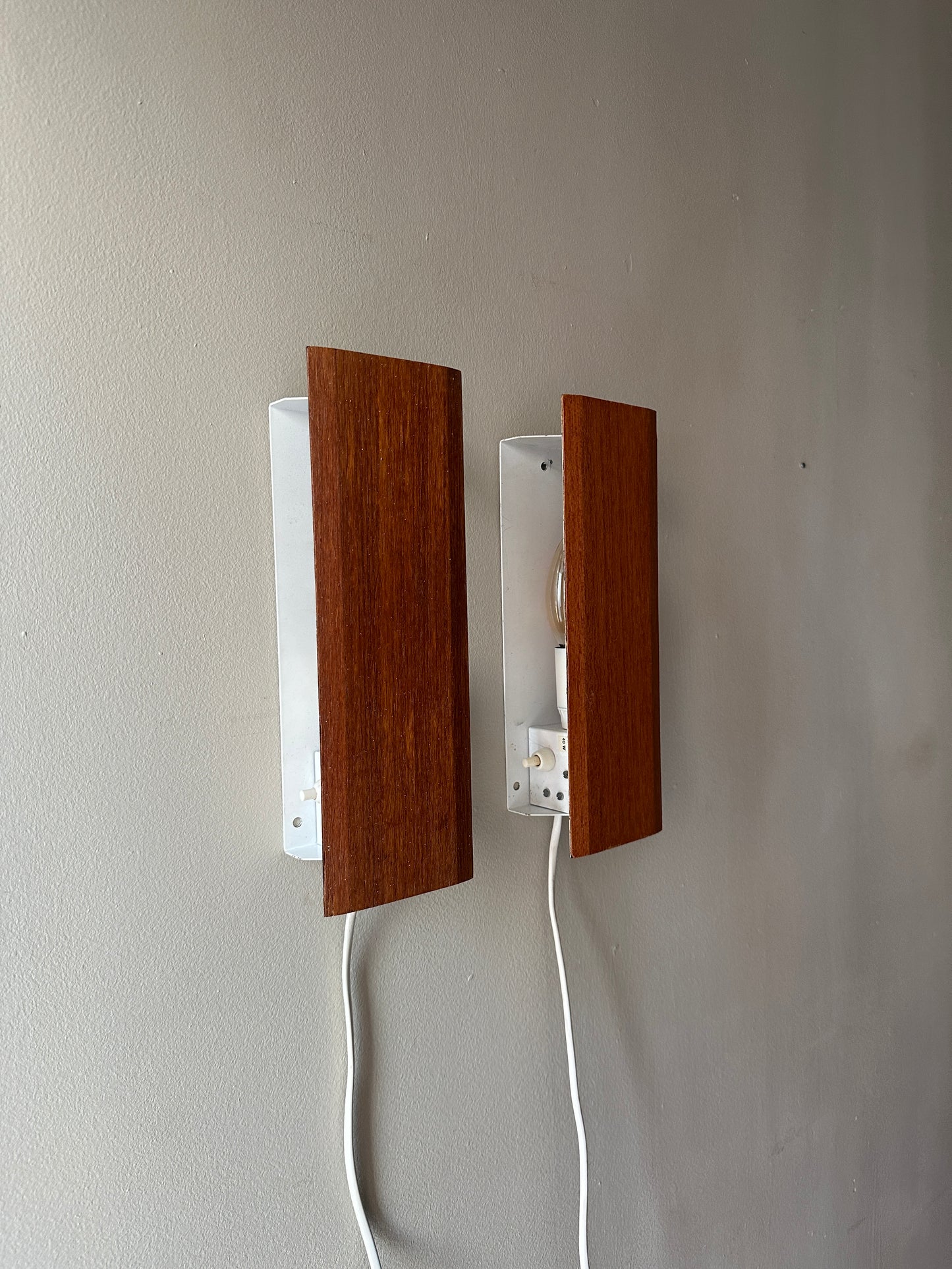 Pair of Scandinavian wall sconces. Sold as pair.