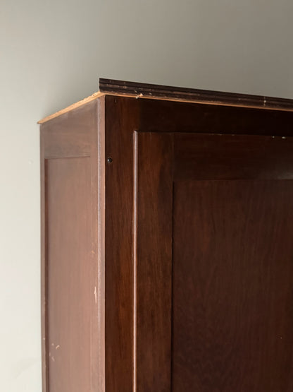 Narrow walnut armoire