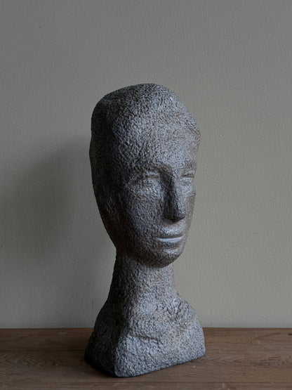 Carved stone double-sided bust