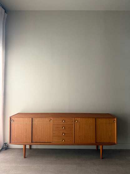 Danish teak sideboard with brass hardware