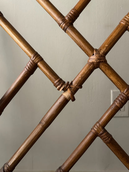 Bamboo arm chairs. Sold individually.