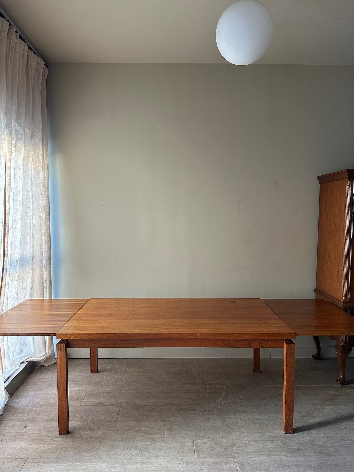 Teak extending dining table