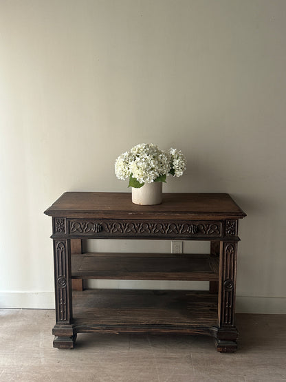 Carved console table