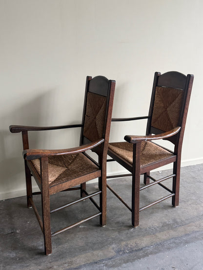 English provincial oak & rush armchairs. Sold individually.