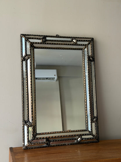 Beaded wall mirror