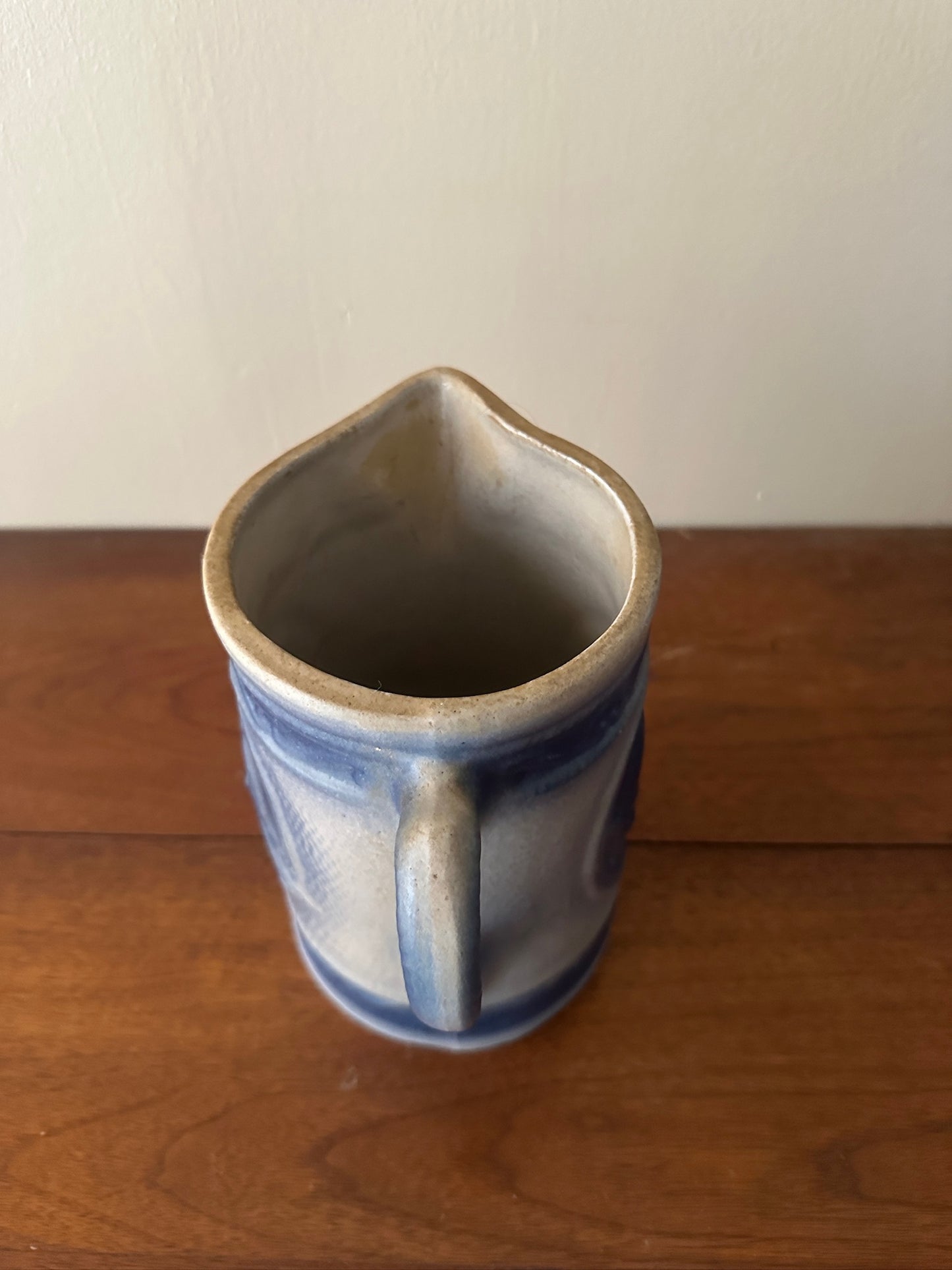 Salt glazed stoneware pitcher with birds
