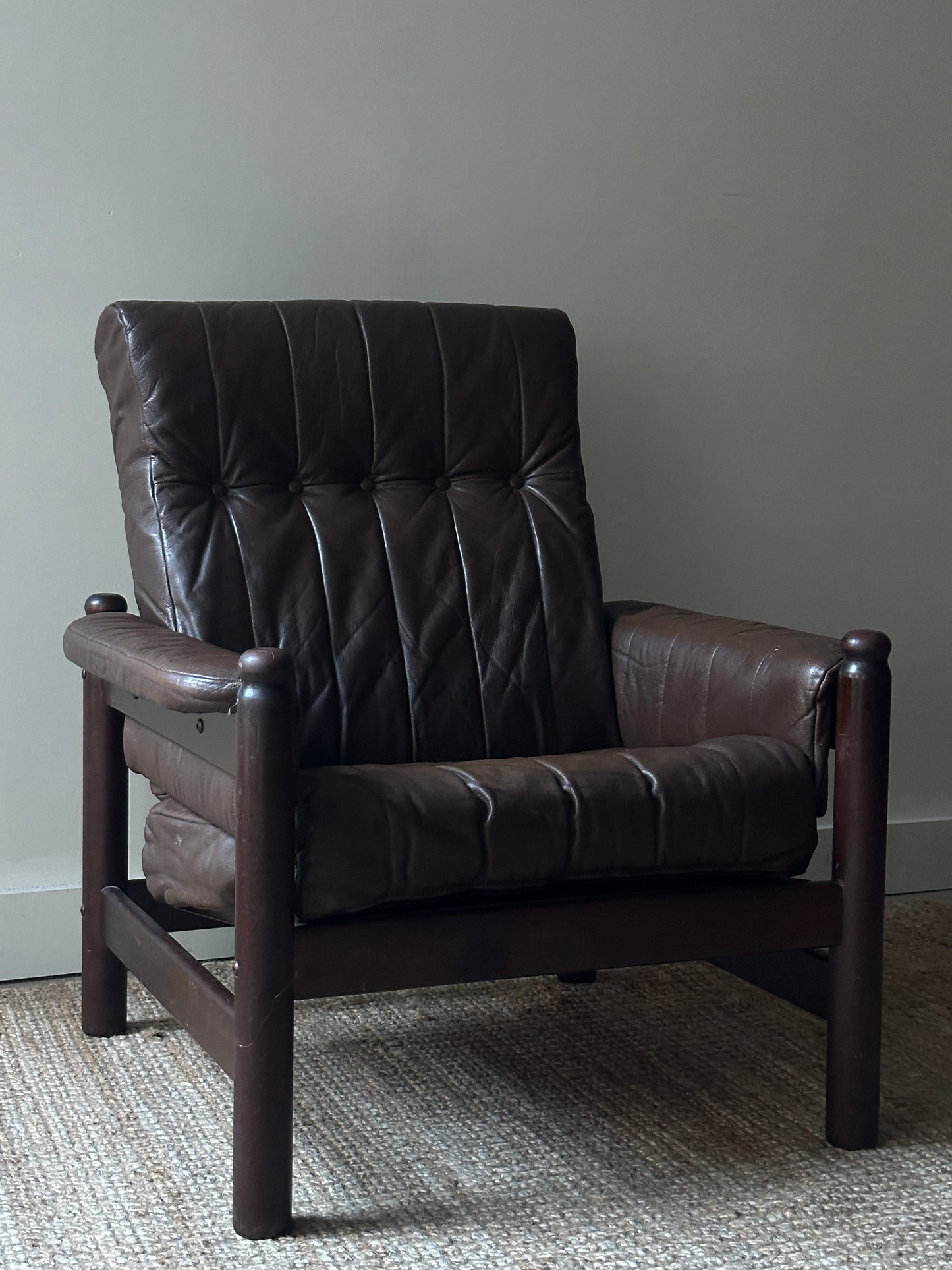 Leather and beech wood armchair. (taller)