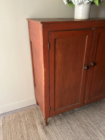Red painted pine jelly cupboard