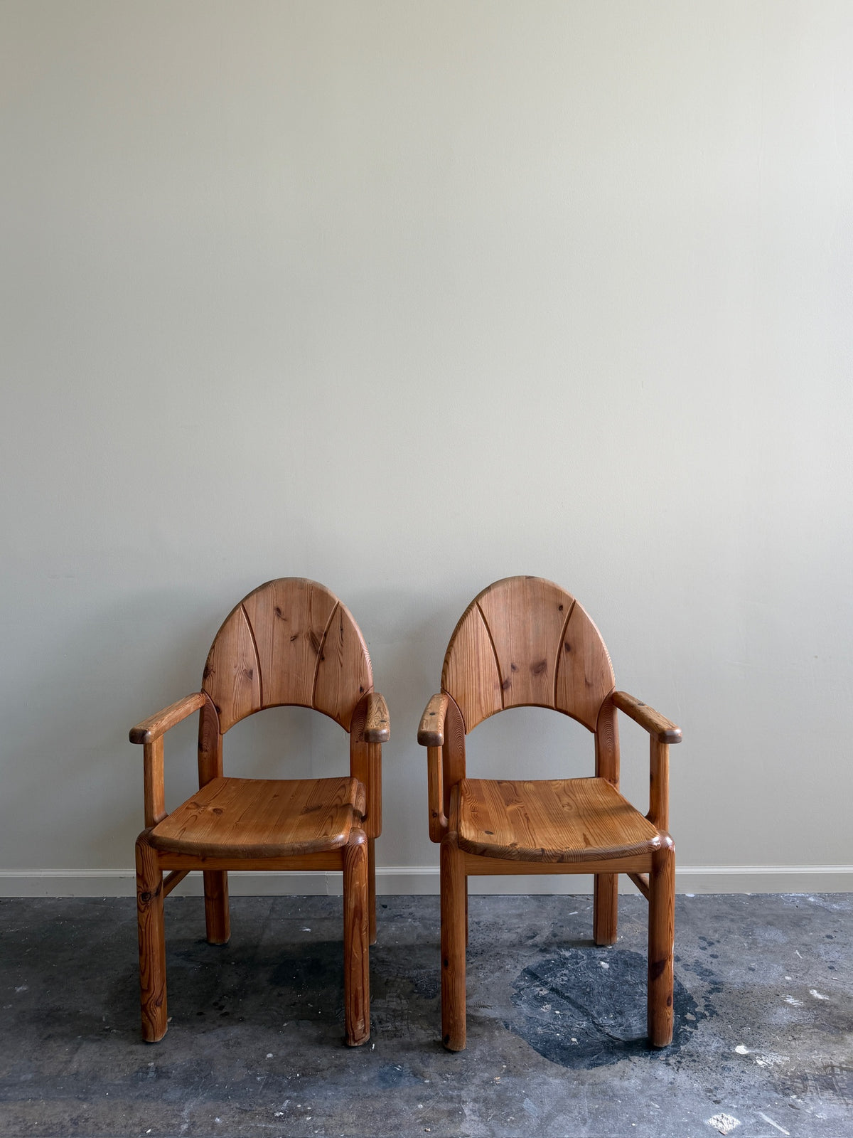 Danish pine arm chairs. Sold individually.