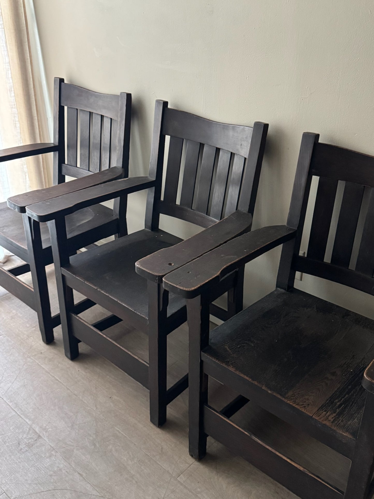 Mission oak arm chairs. Sold individually.