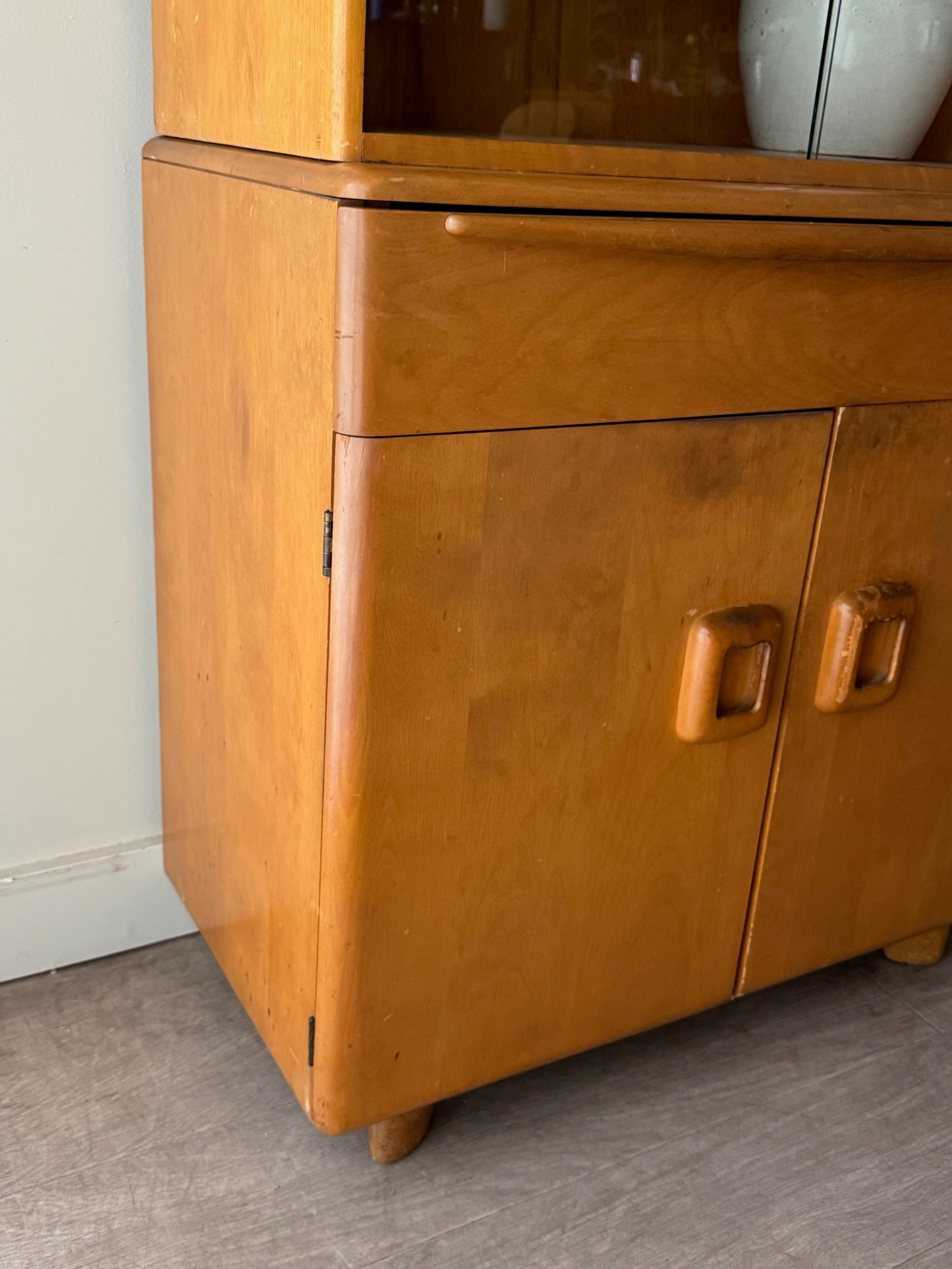 Heywood Wakefield maple two piece display cabinet