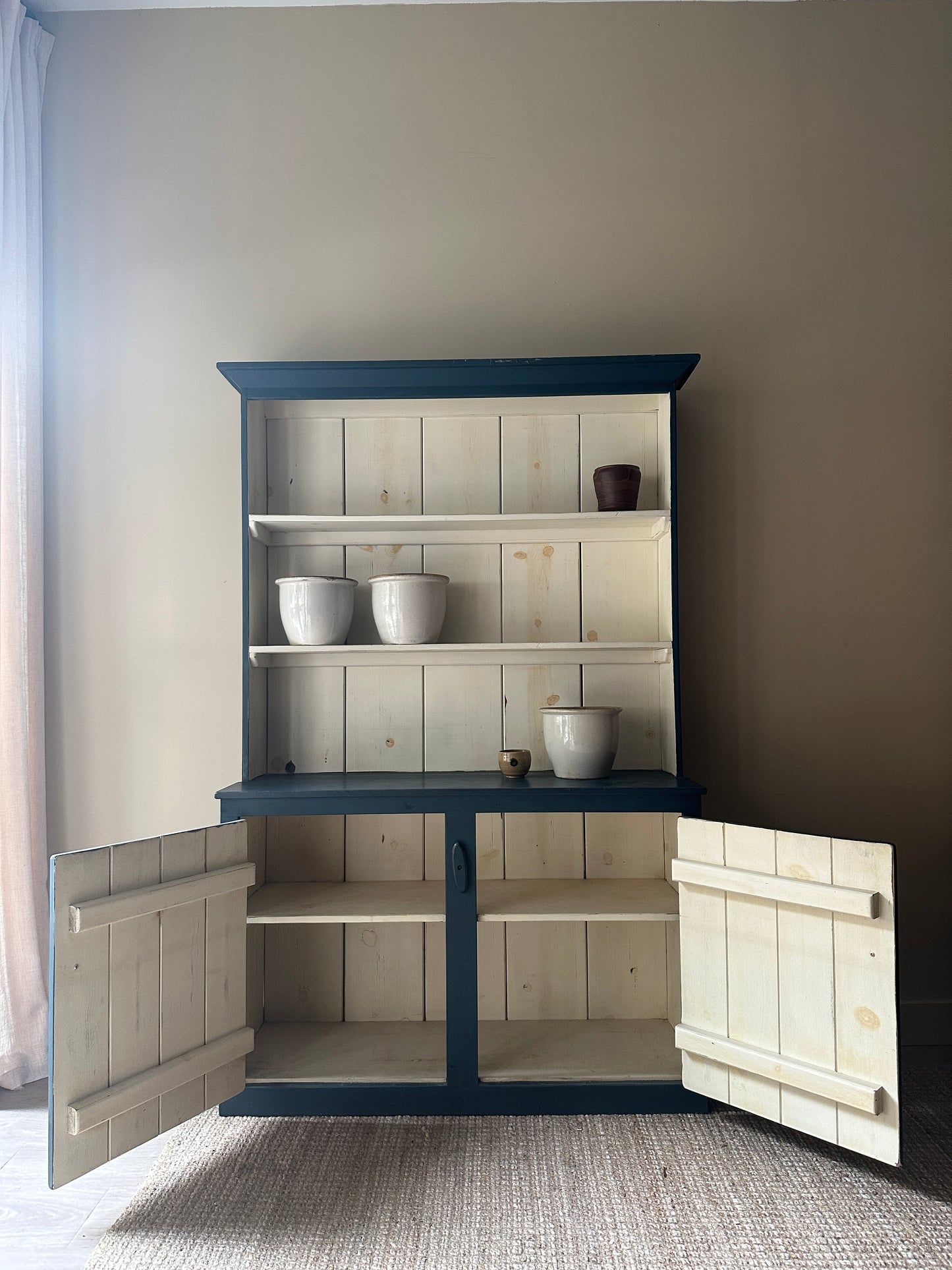 Farmhouse painted blue cupboard