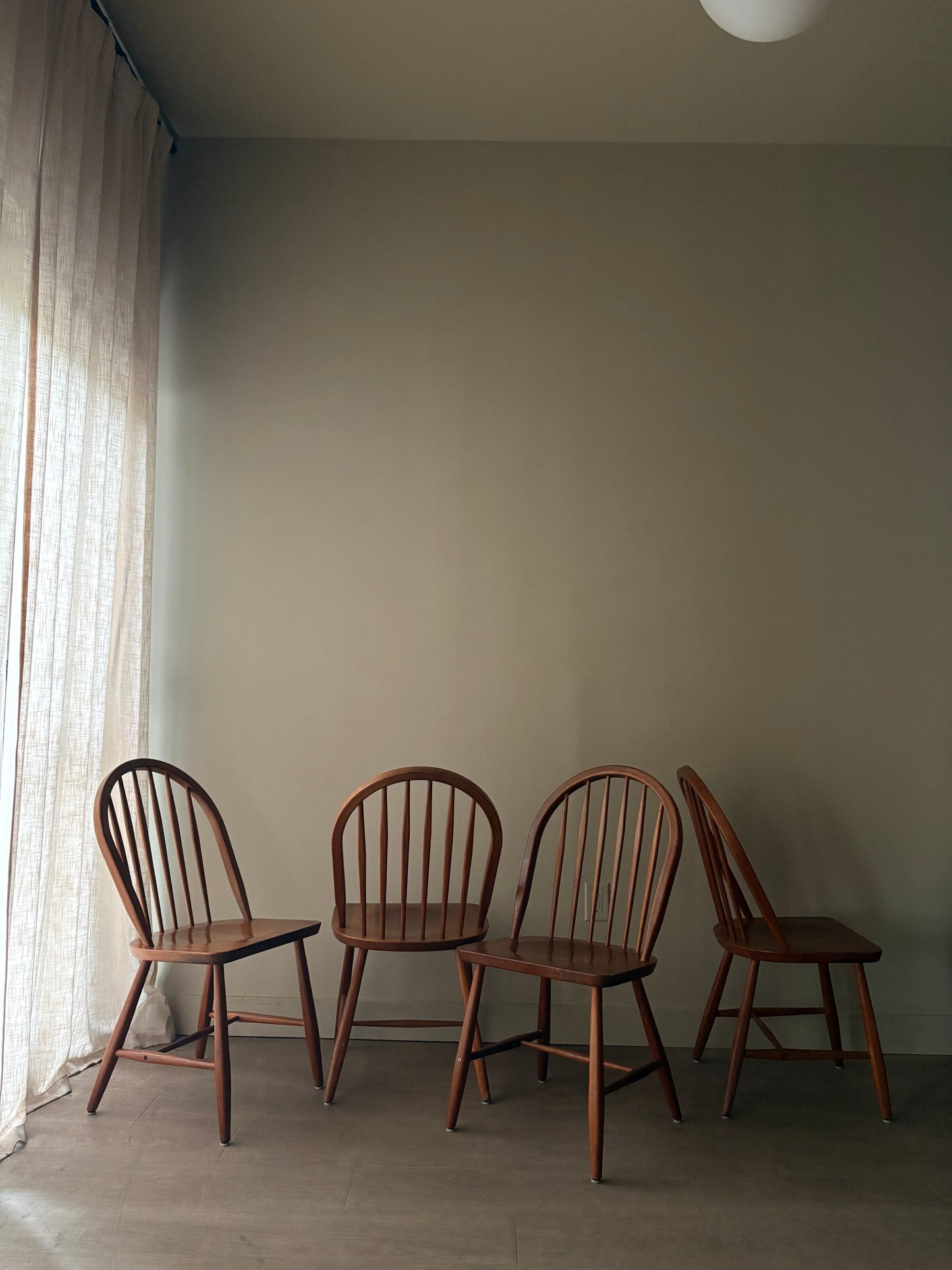 Danish teak hoop-back Windsor dining chairs. Sold in pairs.