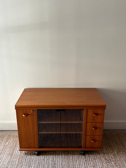 Teak swivel top media cabinet