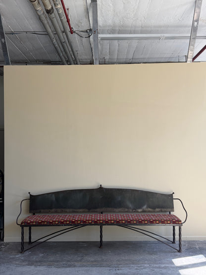 Wrought iron sculptural bench