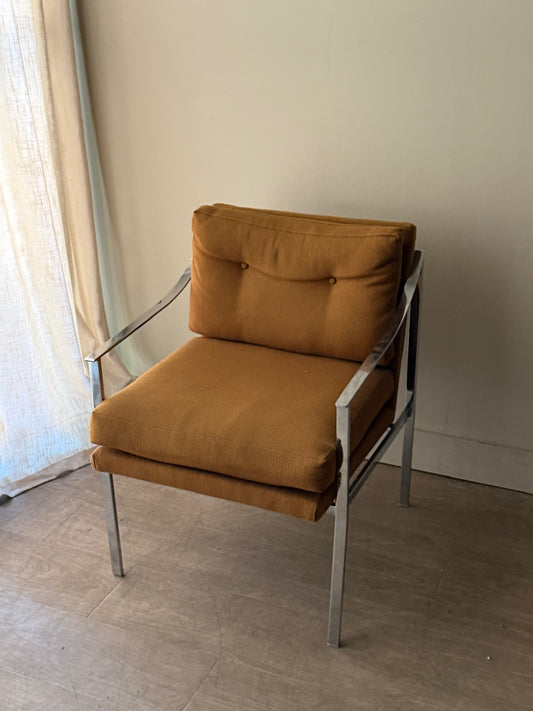 Ochre upholstered chrome armchair