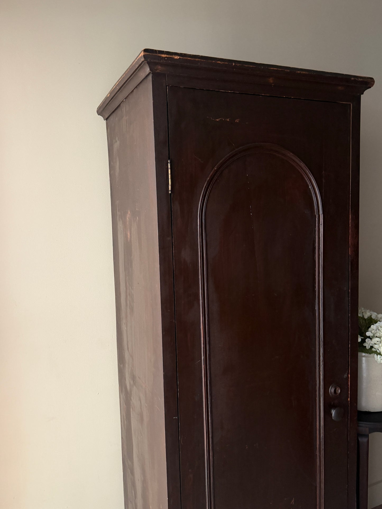 Dark stained chimney cupboard