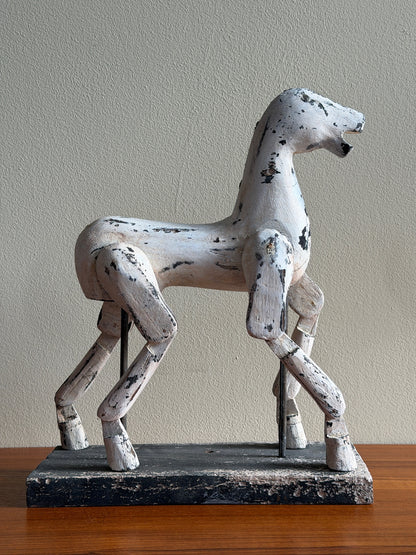 Folk art painted horse sculpture