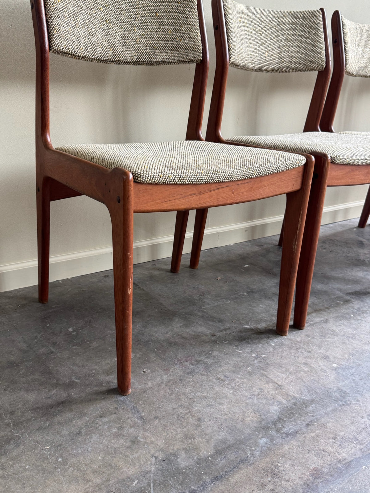 Scandinavian teak upholstered chairs. Sold in pairs.