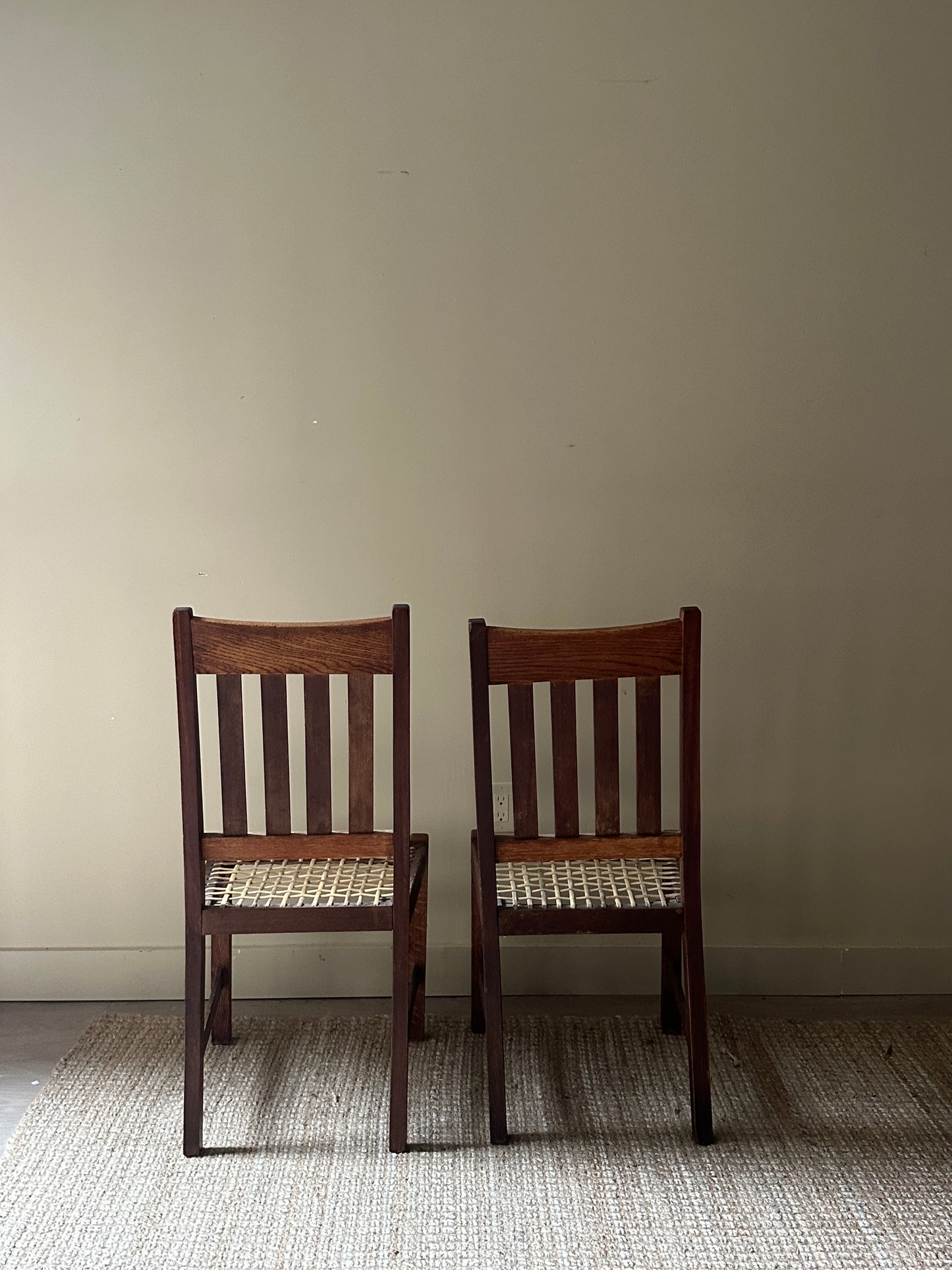 Oak dining chairs. Sold in pair.