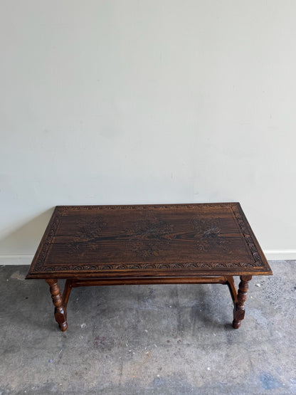 Carved oak coffee table