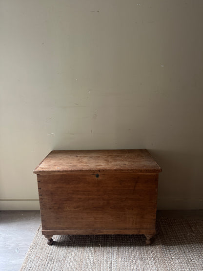 Light pine ball foot chest