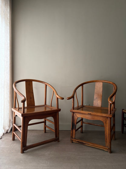 Chinese elmwood yoke back armchairs. Sold individually