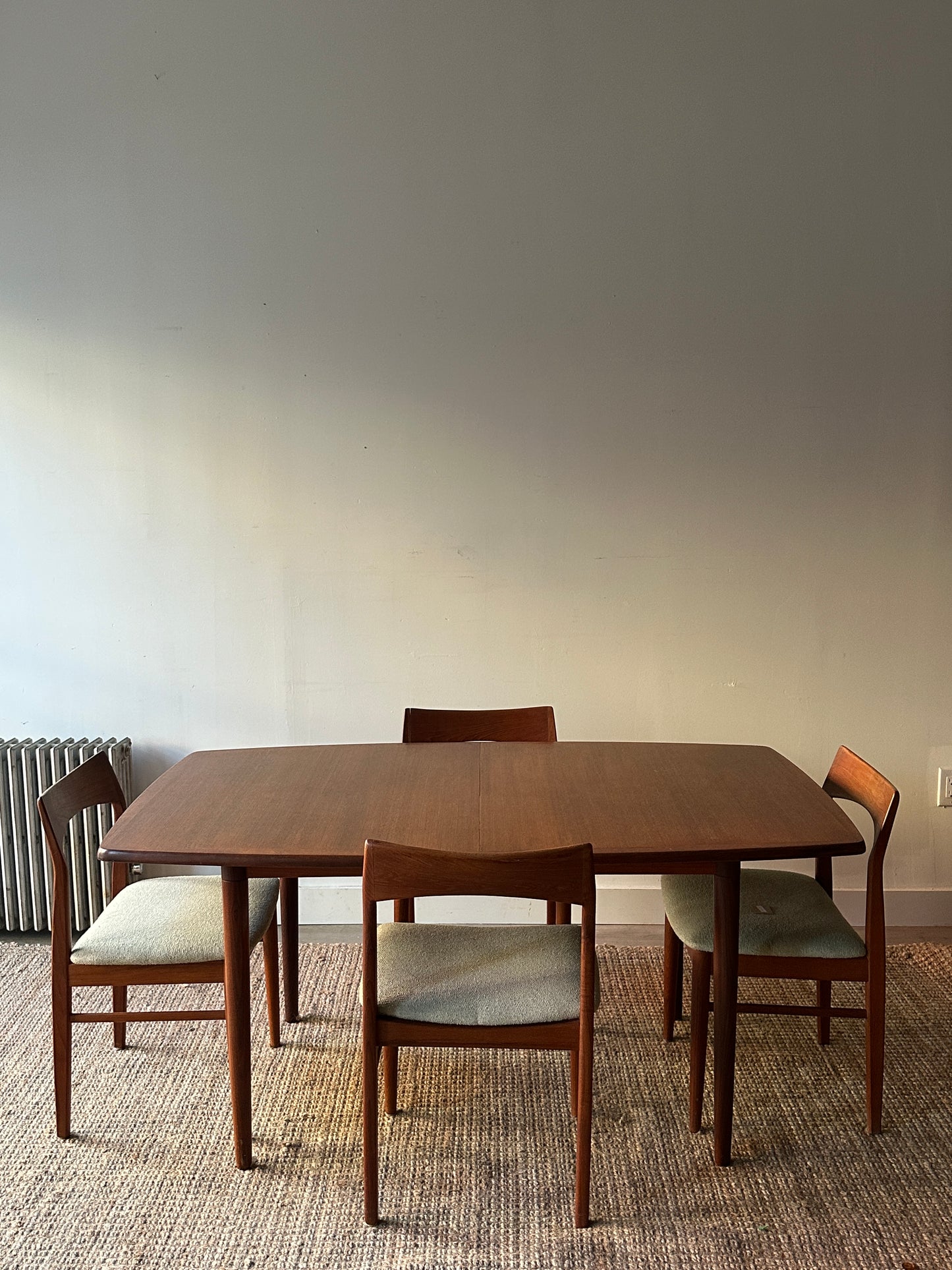 Danish teak dining table with two leaves