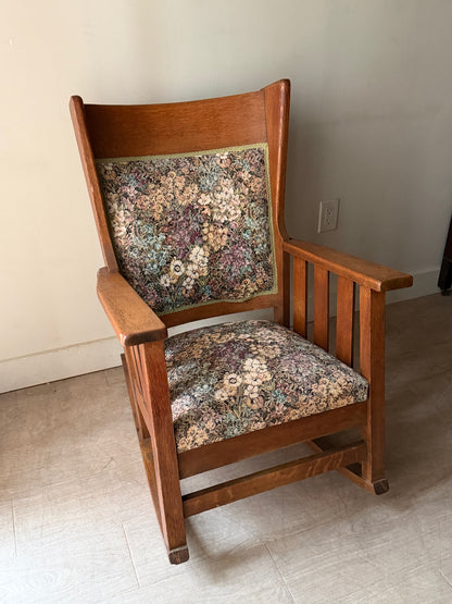 Upholstered golden oak rocking chair