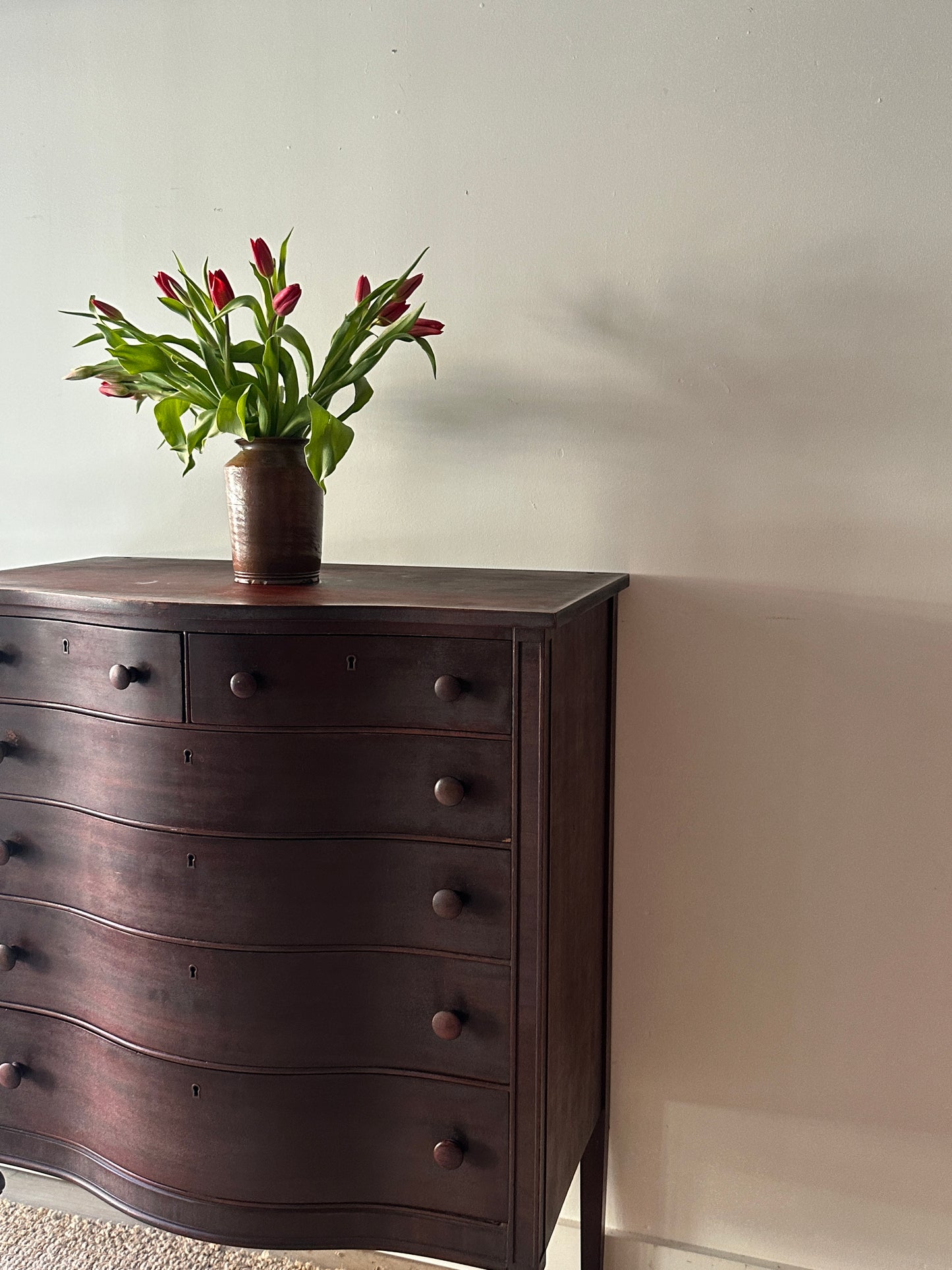 Mahogany serpentine dresser