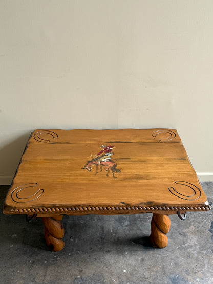 Pine coffee table with equestrian motifs