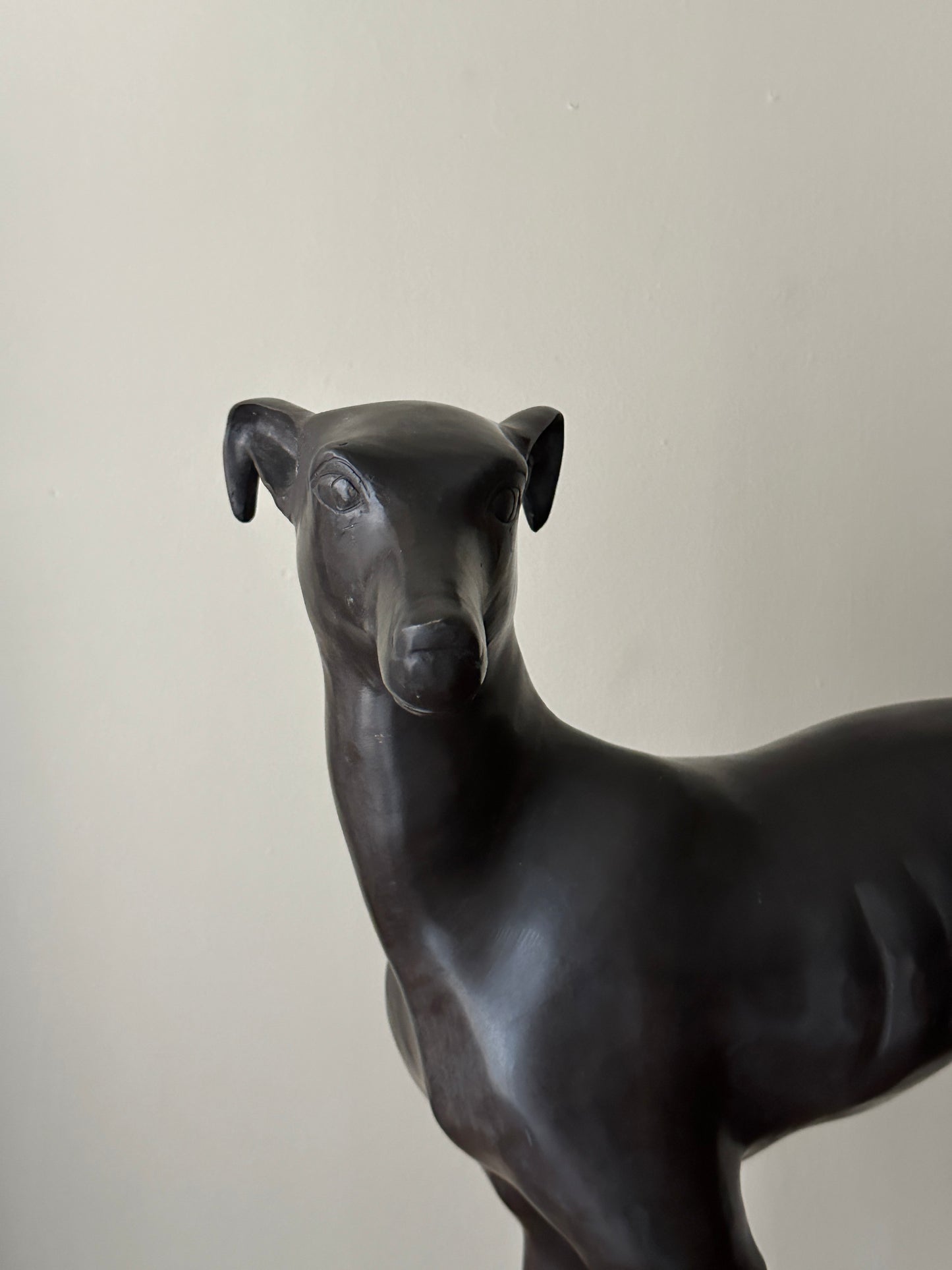 Bronze whippet statue