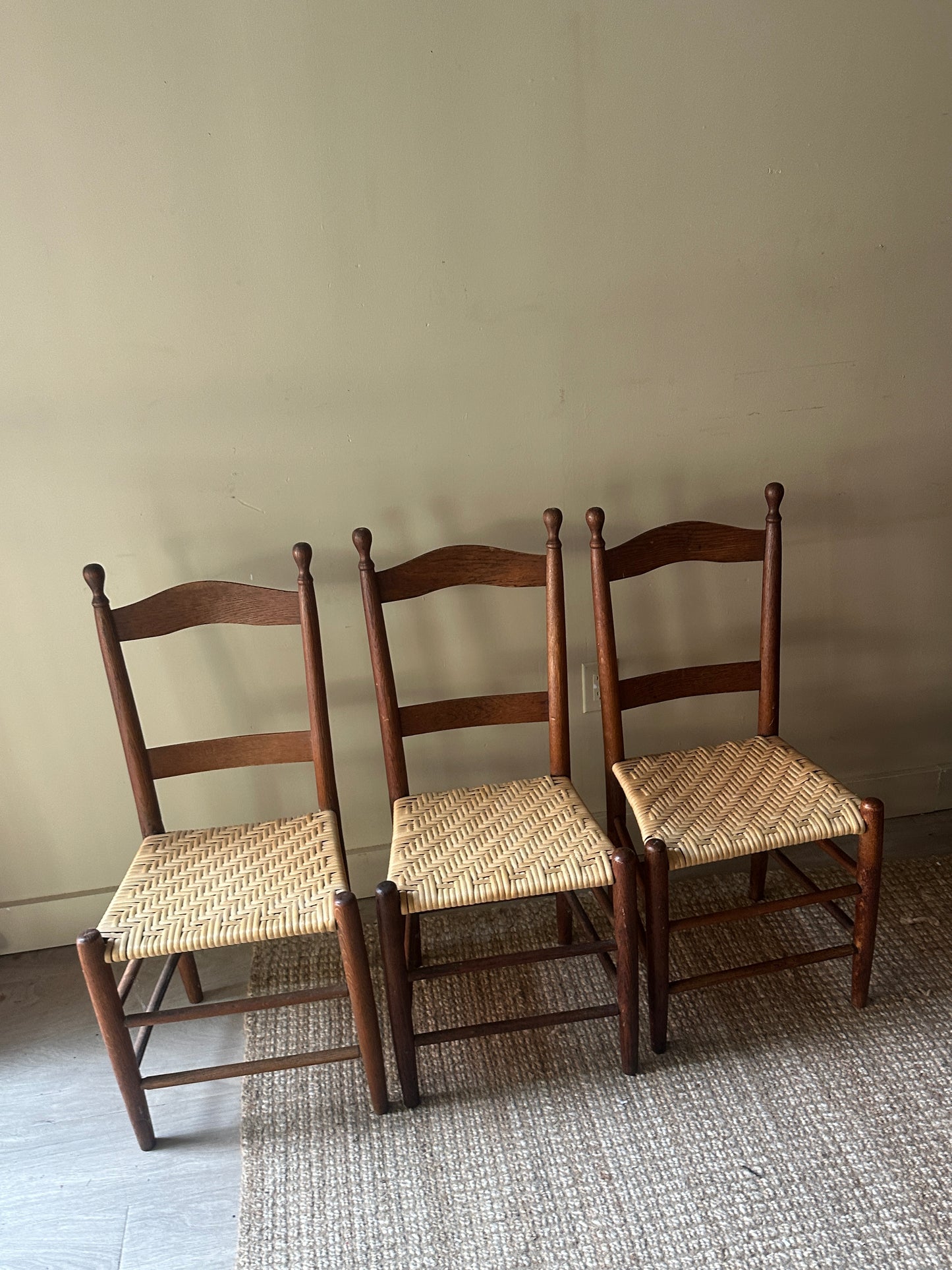 Woven seat chairs. Sold individually.