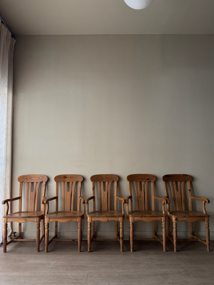 Scandinavian pine dining chairs. Sold in pairs.