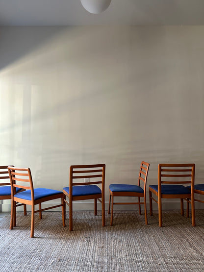 2 maple dining chairs. Sold individually.