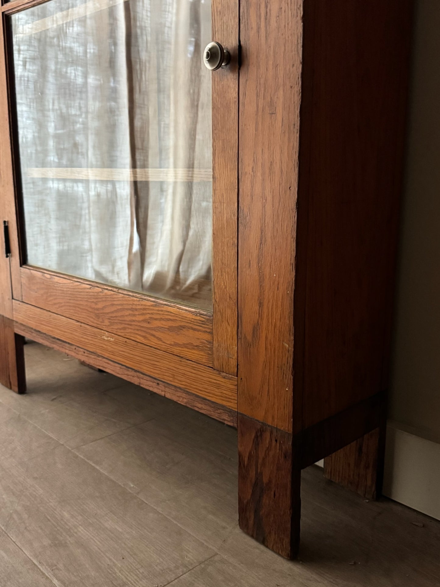 Golden oak display cabinet