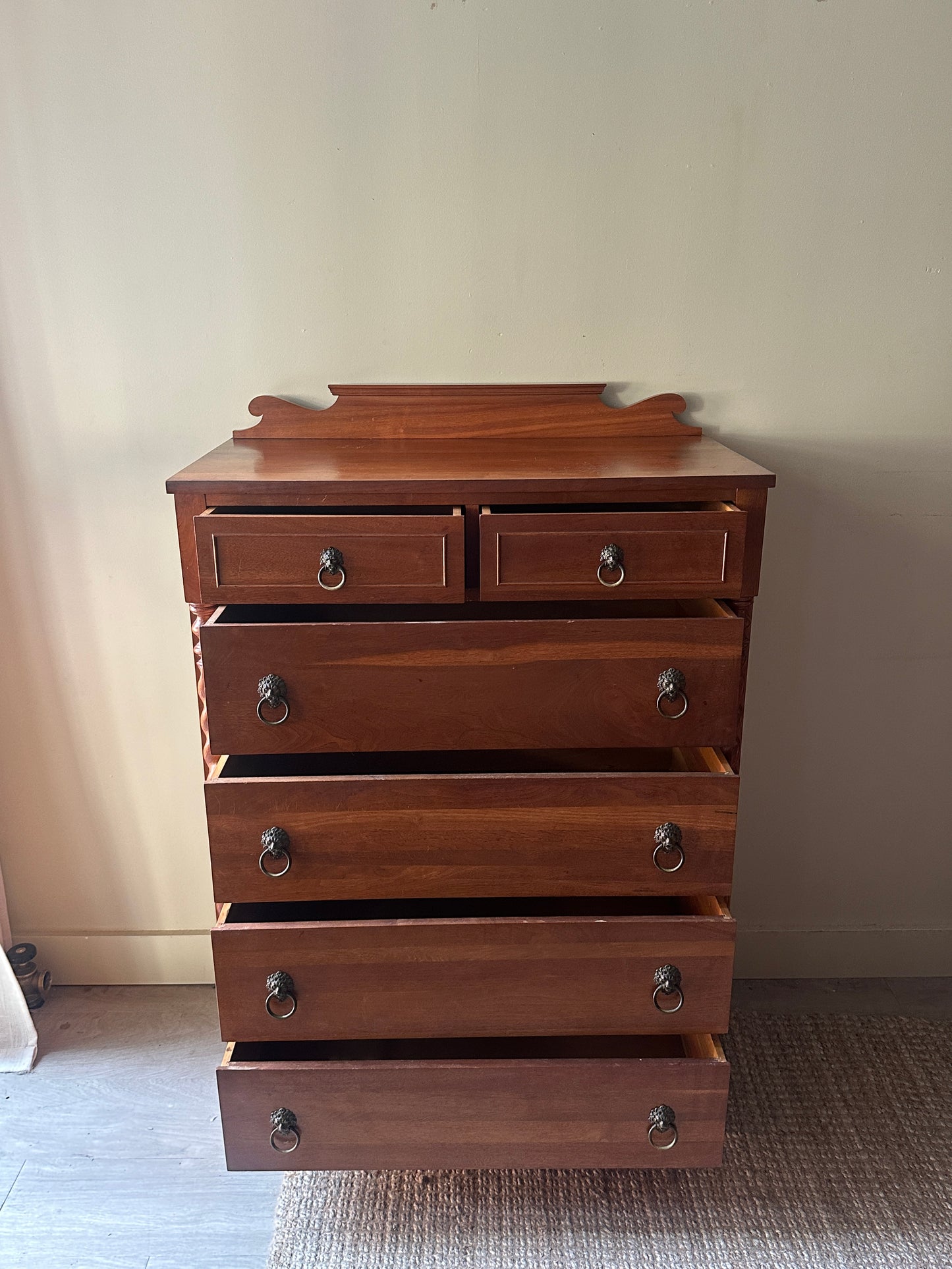 Walnut tallboy with lion head pulls