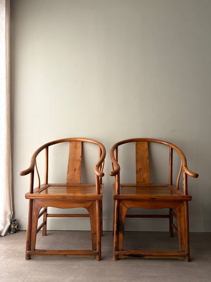 Chinese elmwood yoke back armchairs. Sold individually
