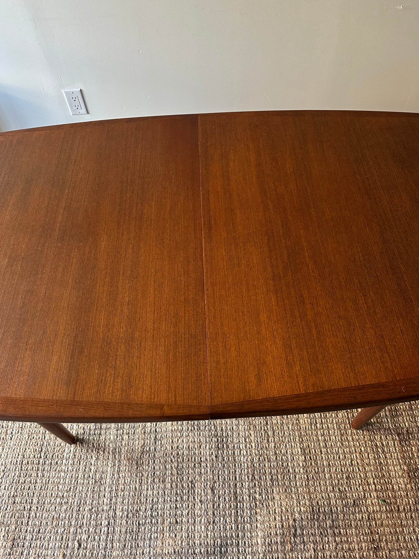 Danish teak dining table with two leaves