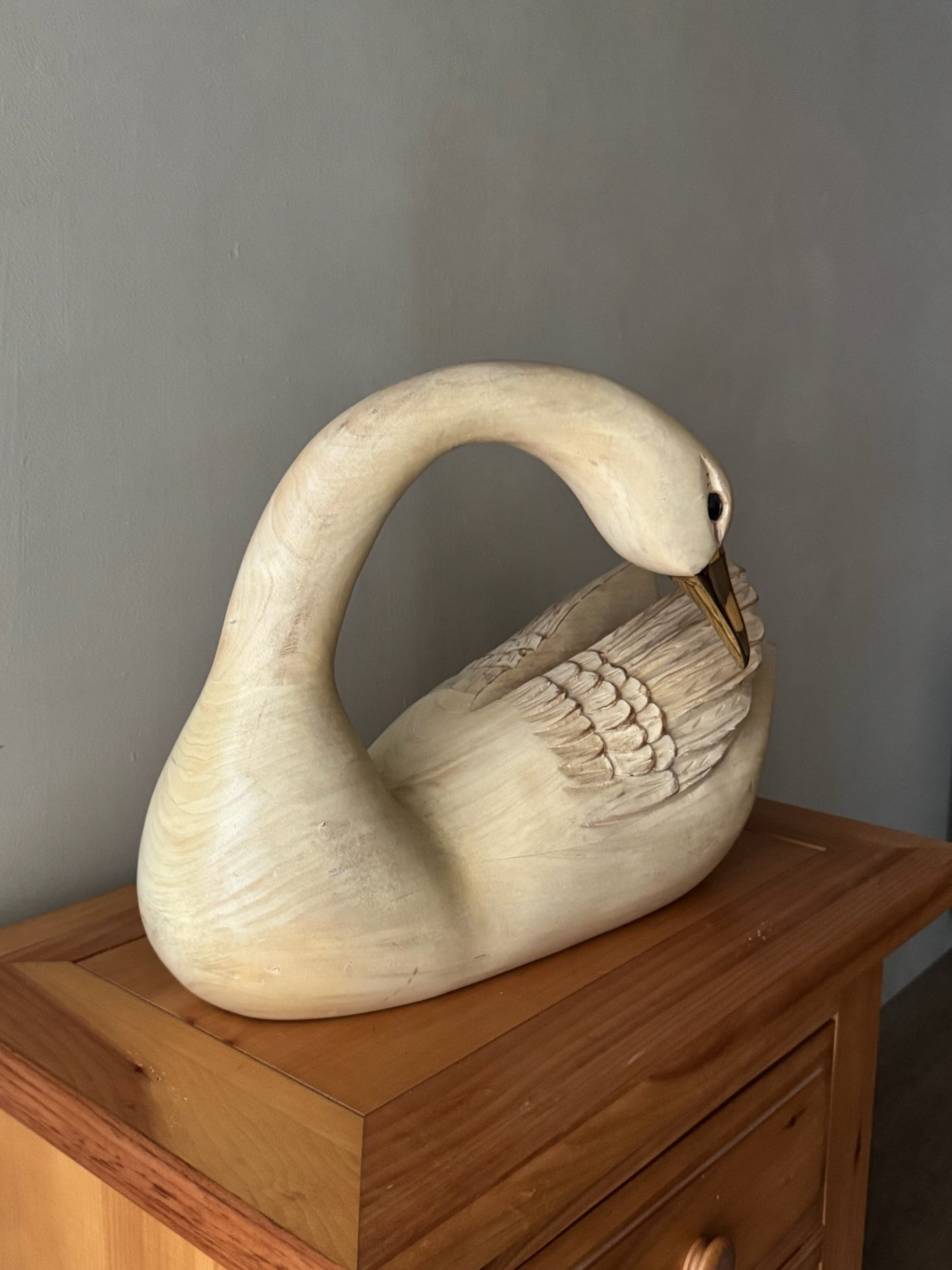 Carved swan sculpture