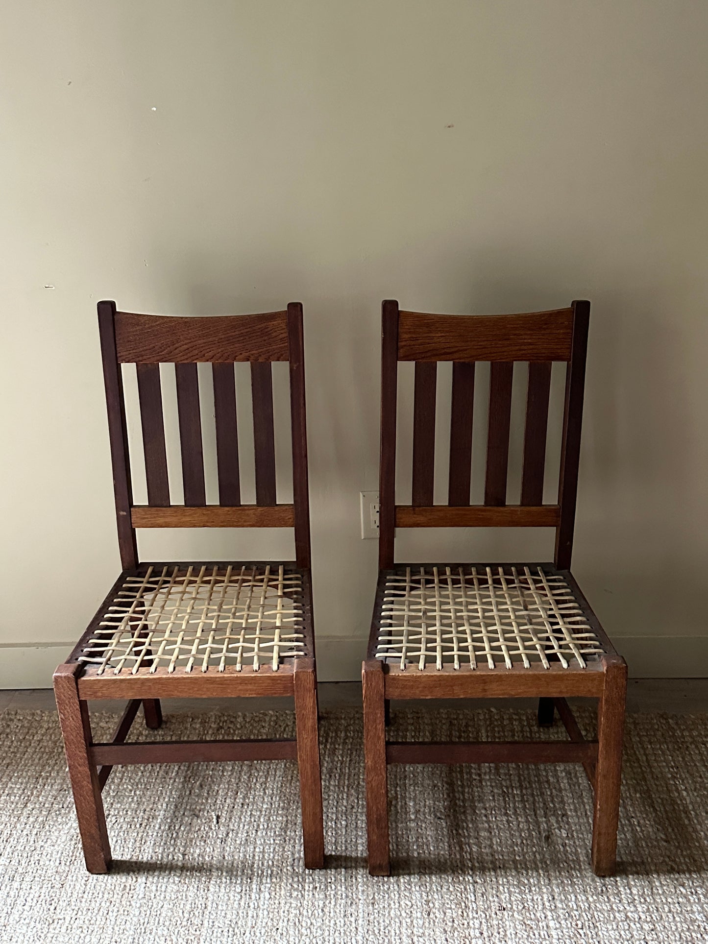 Oak dining chairs. Sold in pair.