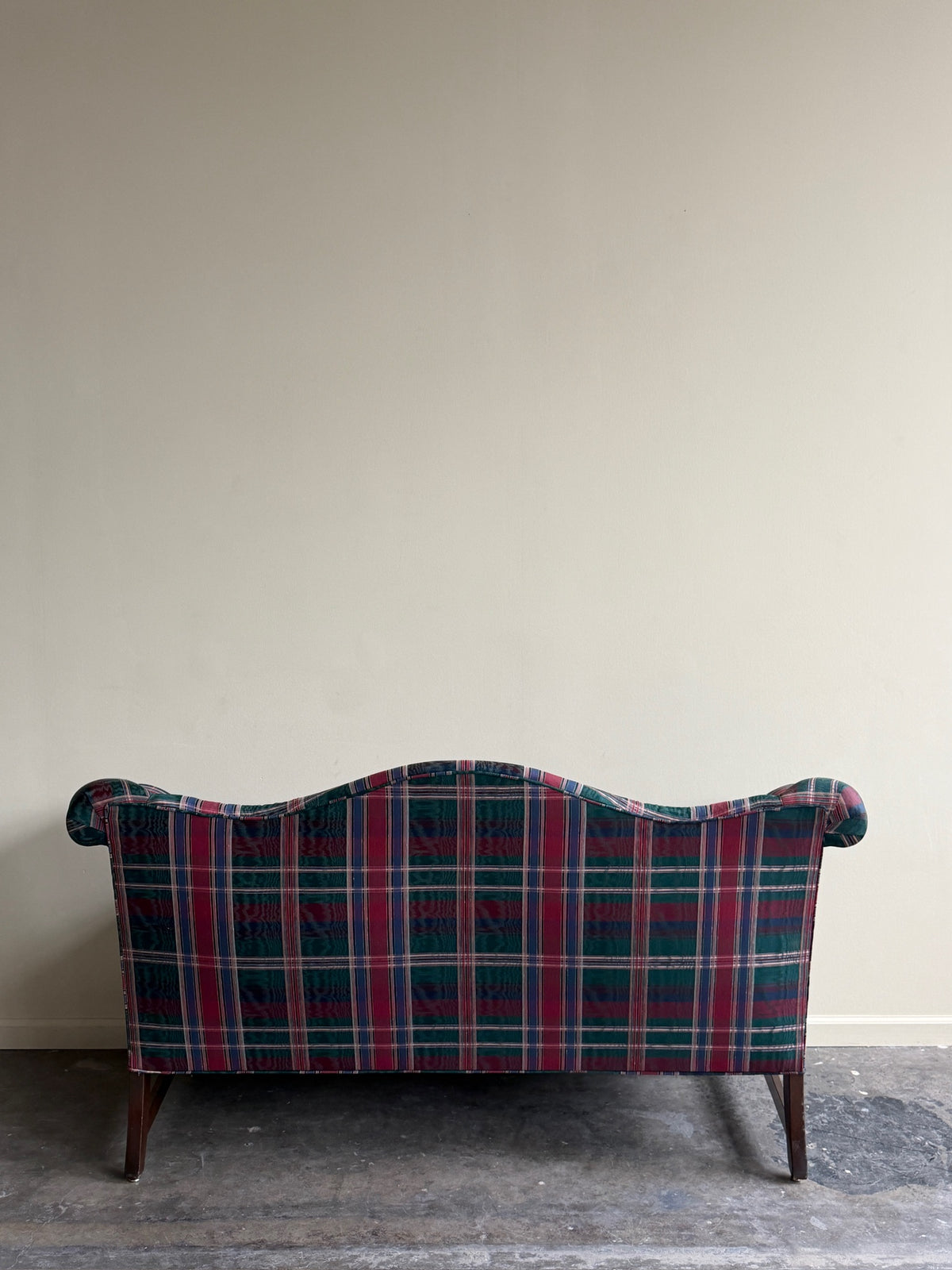 Camelback loveseat in plaid moiré upholstery