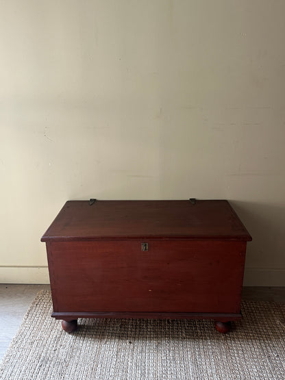 Red ball foot chest