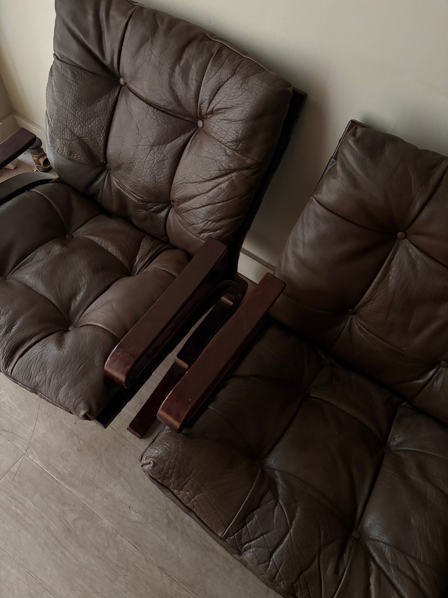 Einar Hove Norwegian brown leather lounge chairs. Sold individually.