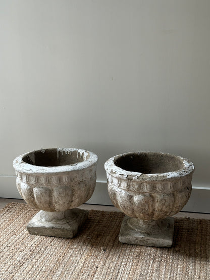 Round concrete planters. Sold individually.