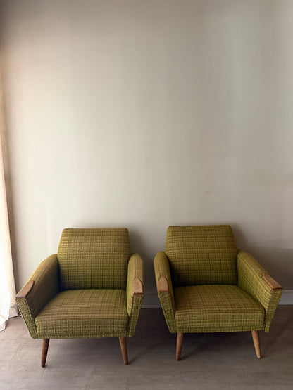 Green plaid Danish lounge chairs. Sold individually.