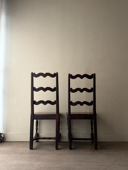 French oak ladder back dining chairs. Sold as a pair.